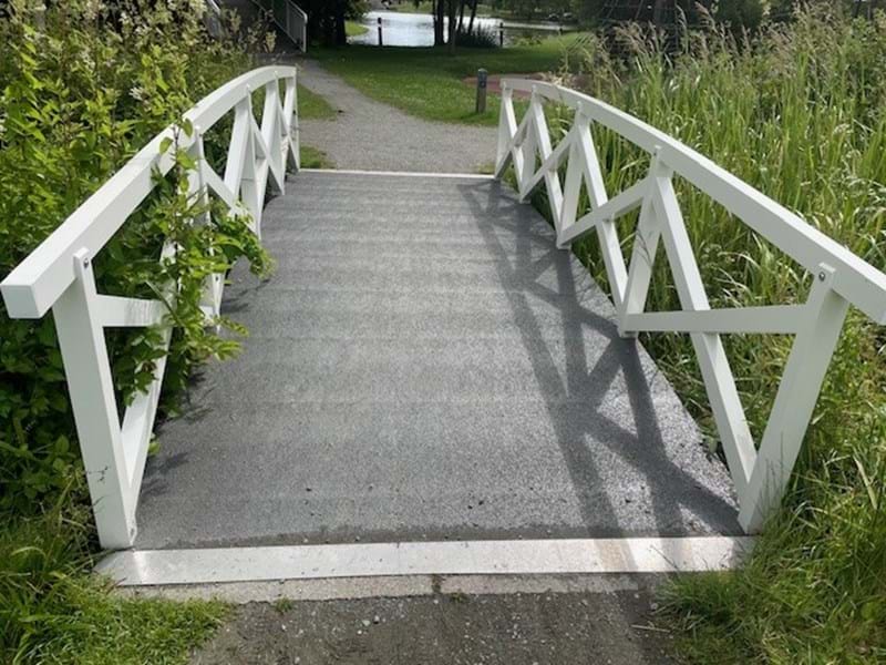Rustic Frp Bridge Low-Maintenance FRP Bridge Replaces Rotten Wooden Structure in Kolding Park